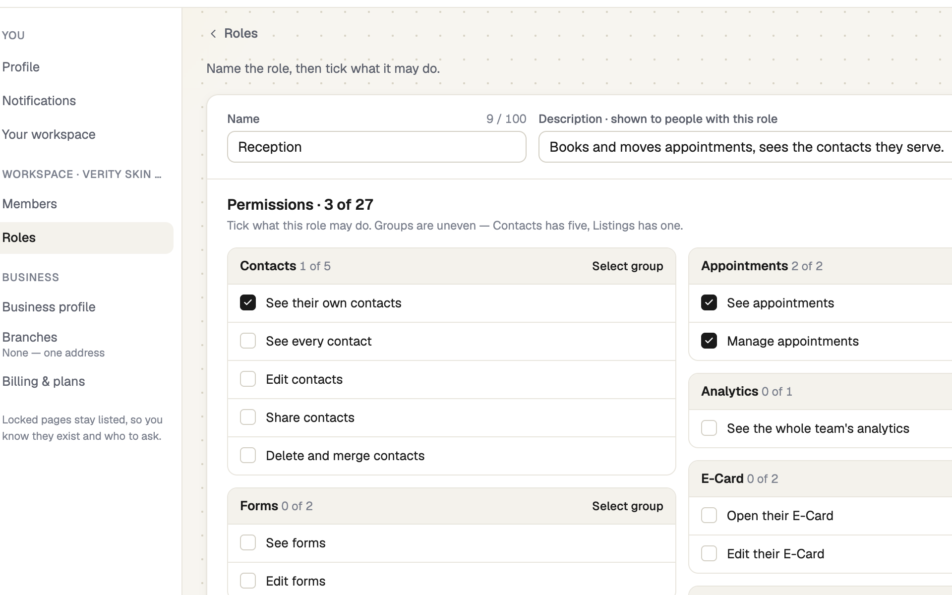 New role page with name, description and grouped permission checkboxes